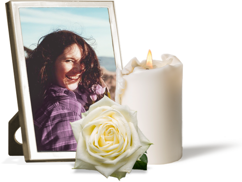 Das Bild eines Verstorbenen mit einer Gedenkkerze und einer Rose